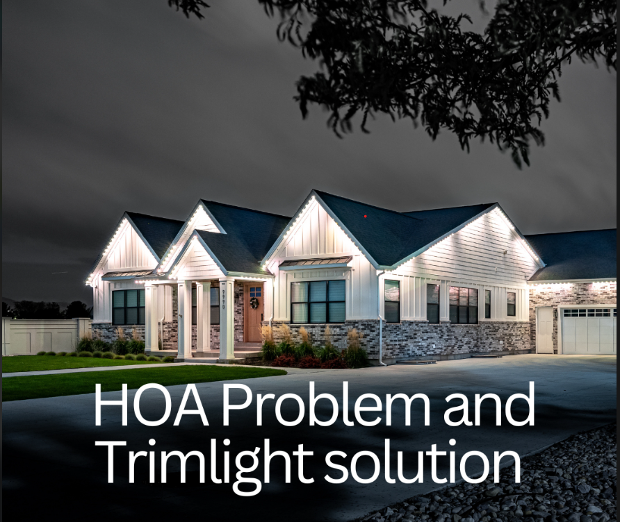 Home at night with permanent white LED lighting along the roofline and soffit